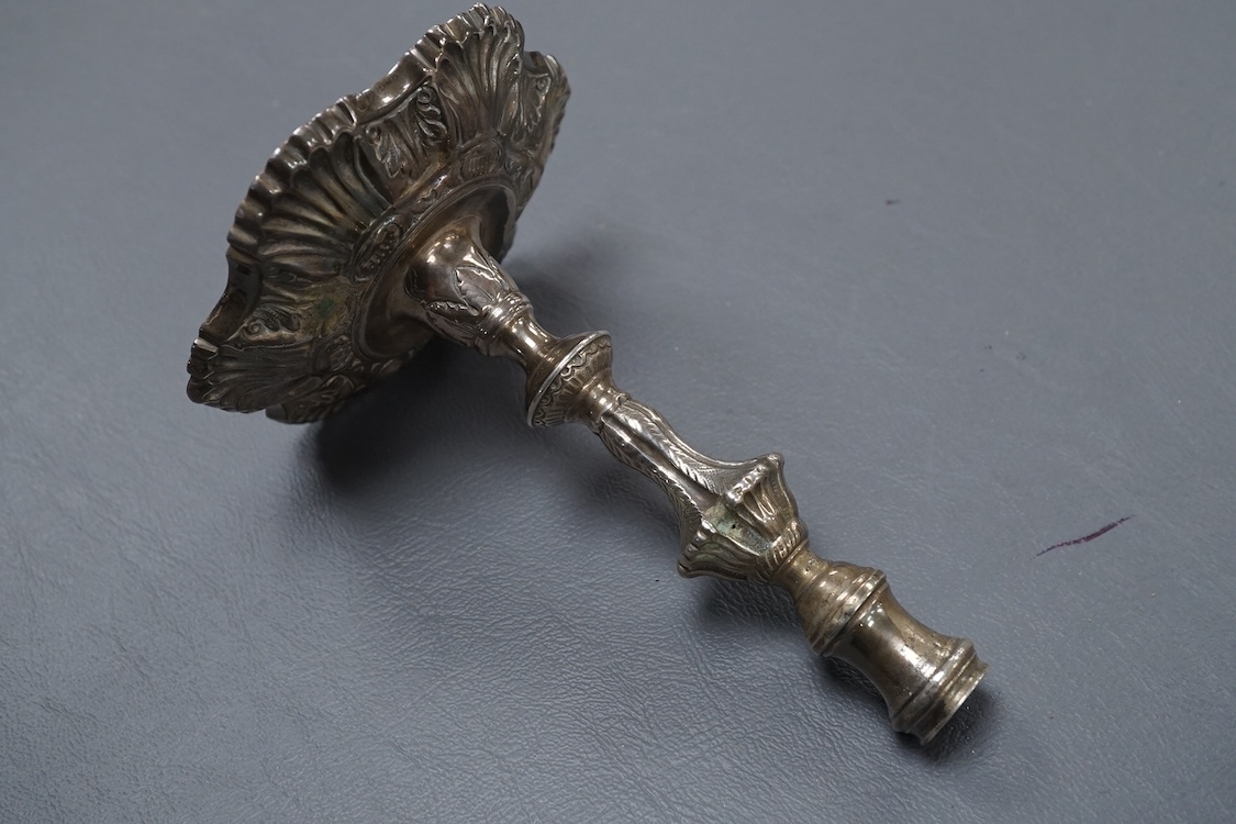 A George II cast silver taperstick, makers mark rubbed, London, 1750, 12cm.